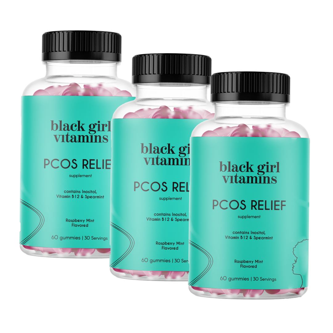 Three bottles of 'Black Girl Vitamins PCOS Relief' supplement gummies.