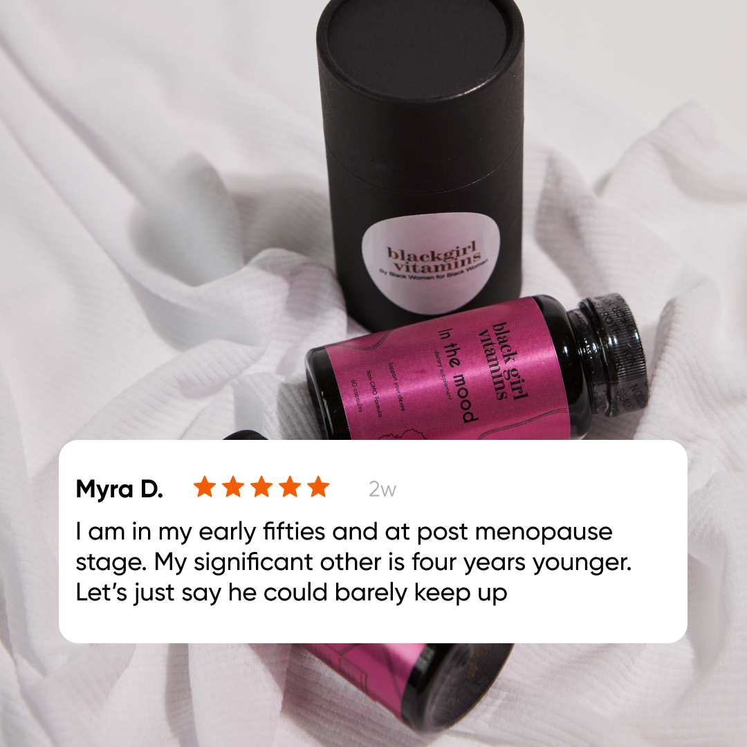 Black girl vitamins dietary supplement bottle labeled 'In the Mood' with black cylindrical container